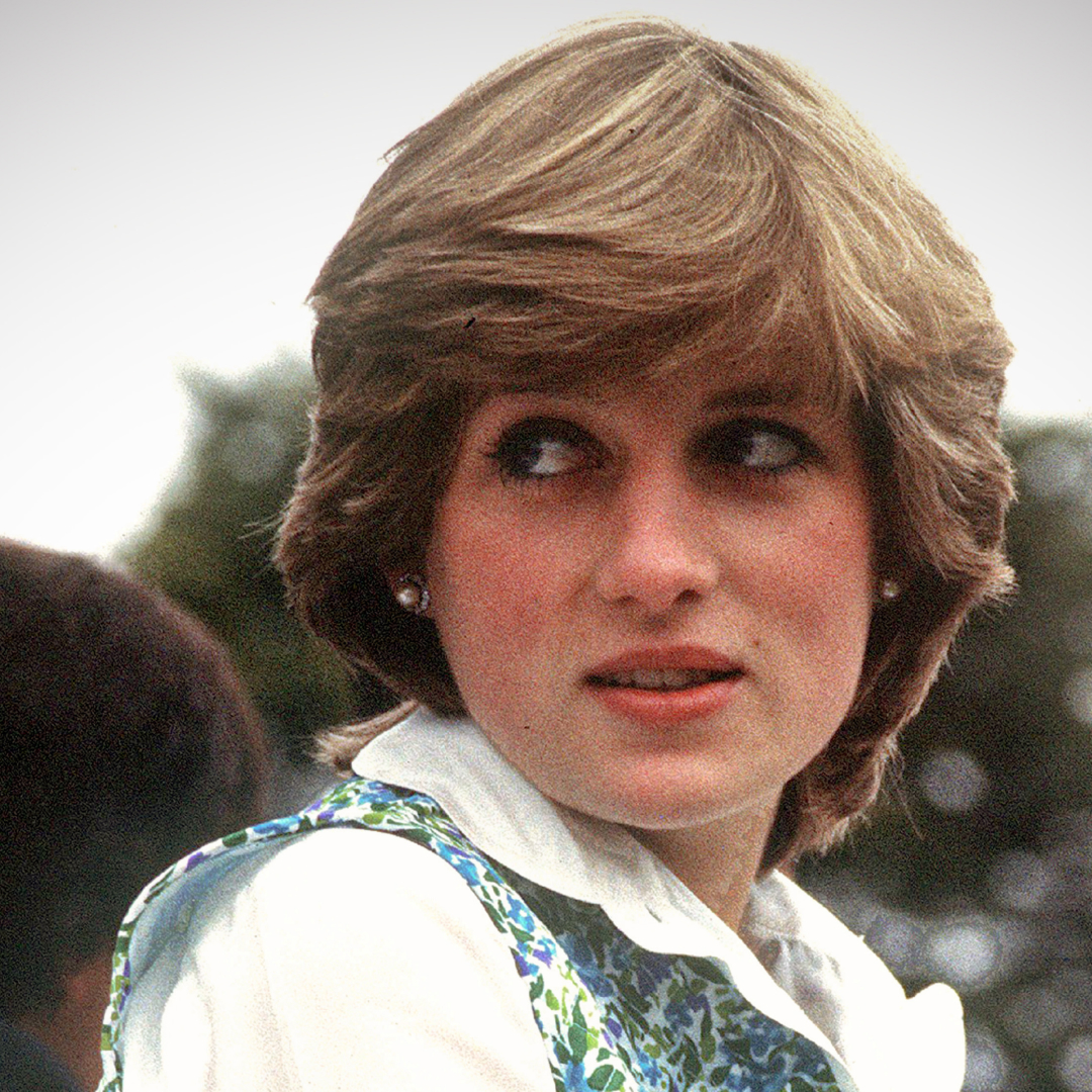 Lady Diana Spencer wearing a white shirt with a blue floral vest