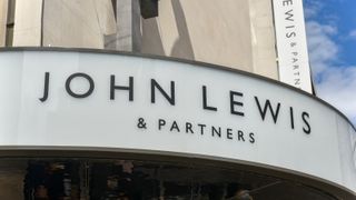 A John Lewis logo on the front of a shop