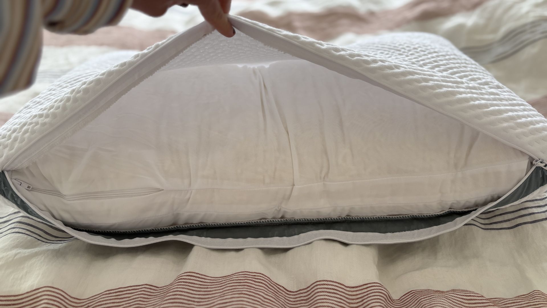 Testing the Eli &amp;amp; Elm Ultimate Side Sleeper Pillow, showing it on the bed
