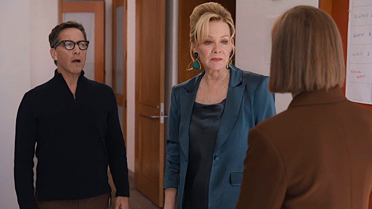 Rob (Dan Bucatinsky) watches Deborah (Jean Smart) talk to Ava (Hannah Einbinder) on Hacks.