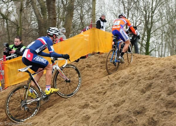 Riders climbing with one lap to go