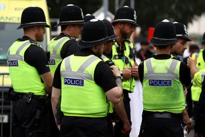 Police officers standing around 