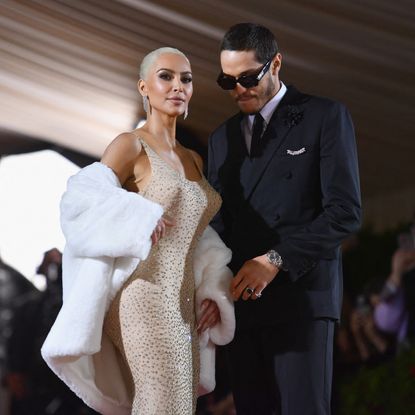 US socialite Kim Kardashian and comedian Pete Davidson arrive for the 2022 Met Gala at the Metropolitan Museum of Art on May 2, 2022, in New York. - The Gala raises money for the Metropolitan Museum of Art's Costume Institute. The Gala's 2022 theme is "In America: An Anthology of Fashion"