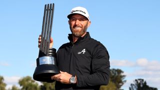 Dustin Johnson with the trophy after winning the LIV Golf Las Vegas trophy