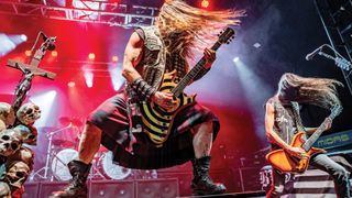 Zakk Wylde playing guitar onstage