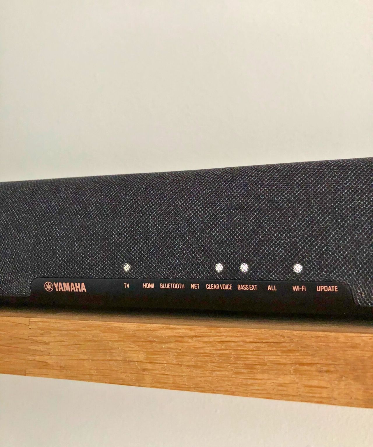 Yamaha True X Bar 50A soundbar on wooden shelf in Dan Fauzi's home.