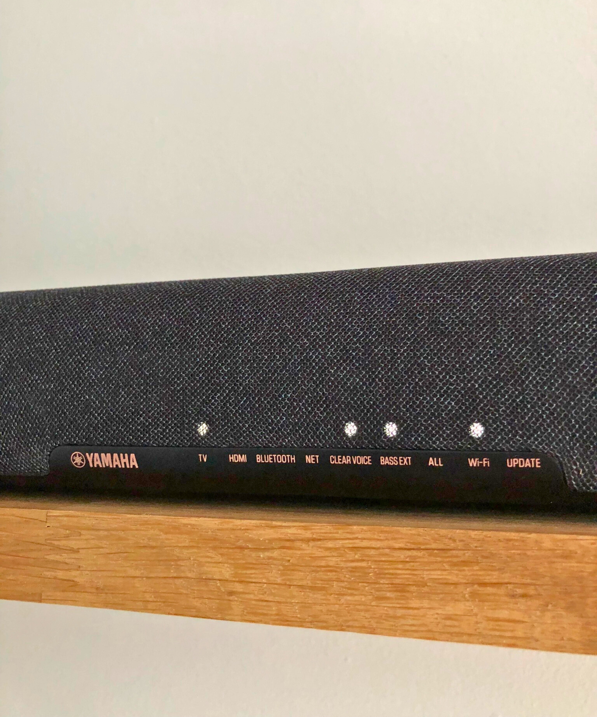 Yamaha True X Bar 50A soundbar on wooden shelf in Dan Fauzi&#039;s home.