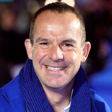journalist martin lewis in blue coat and stole