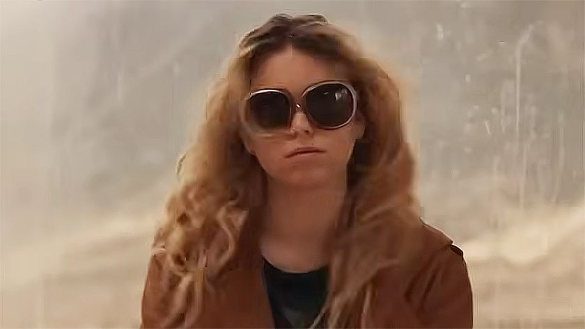 Milly Alcock&#039;s Kara Zor-El wearing a brown coat and sunglasses in 2026&#039;s Supergirl movie