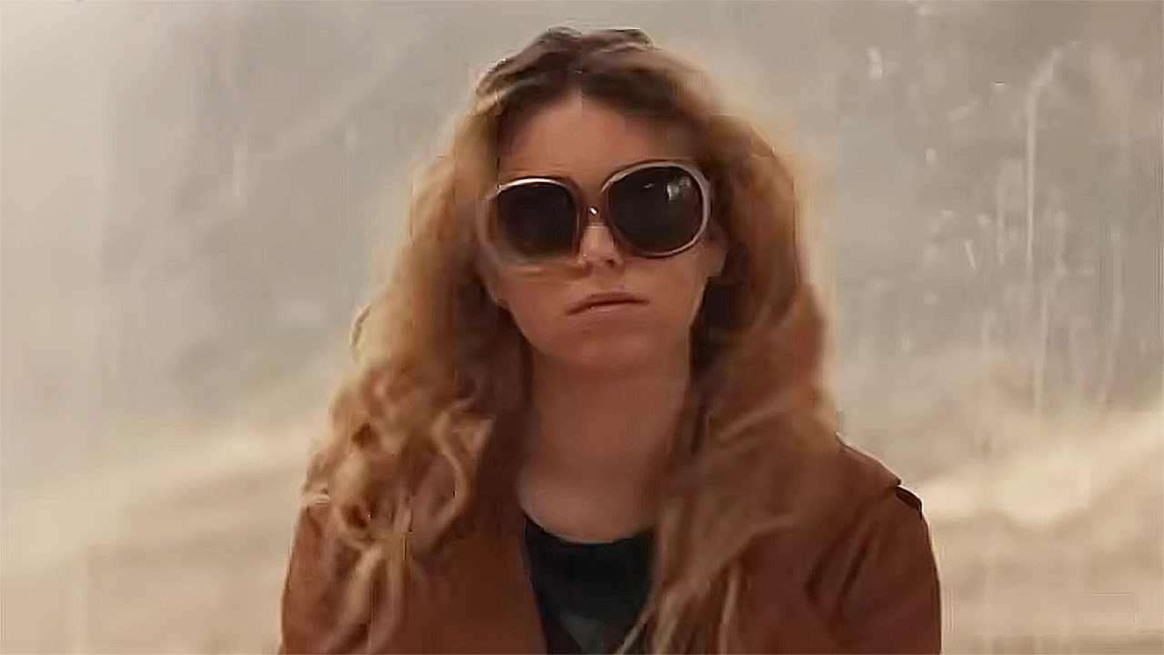 Milly Alcock&#039;s Kara Zor-El wearing a brown coat and sunglasses in 2026&#039;s Supergirl movie