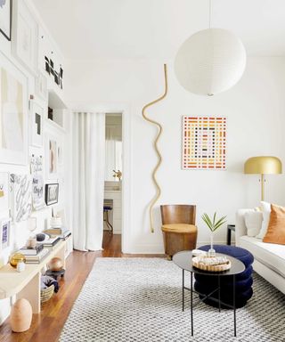 A gallery wall in a white living room