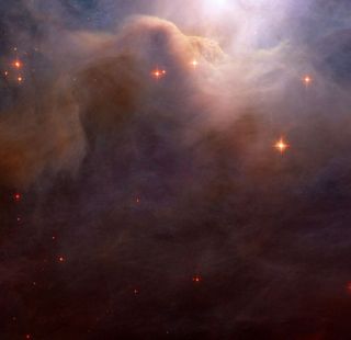 Hubble Photographs Billowing Clouds of Cosmic Dust