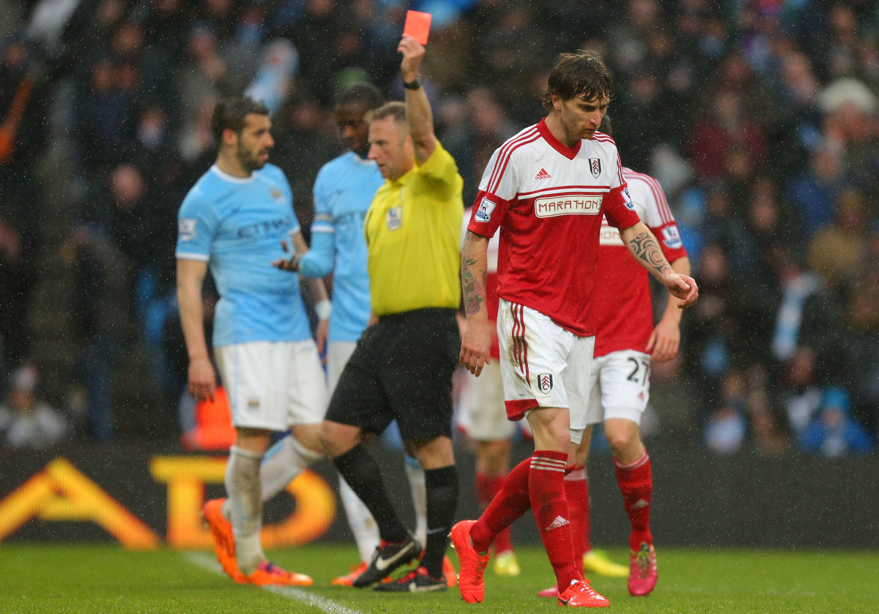 Fernando Amorebieta is sent off while playing for Fulham against Manchester City in 2014