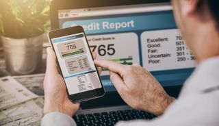 Credit score on phone and laptop