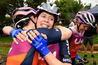 Ruby Roseman-Gannon (Jayco-AlUla) is congratulated by teammates after winning the elite women's road race title at the Australian Road National Championships 2024