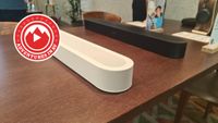 Sonos Beam Ultra on table with Adventures in AV logo
