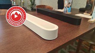 Sonos Beam Ultra on table with Adventures in AV logo