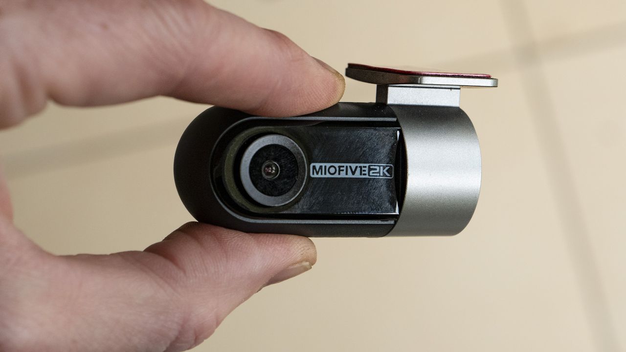 Miofive Dual Dash Cam tiny rear camera in the hand