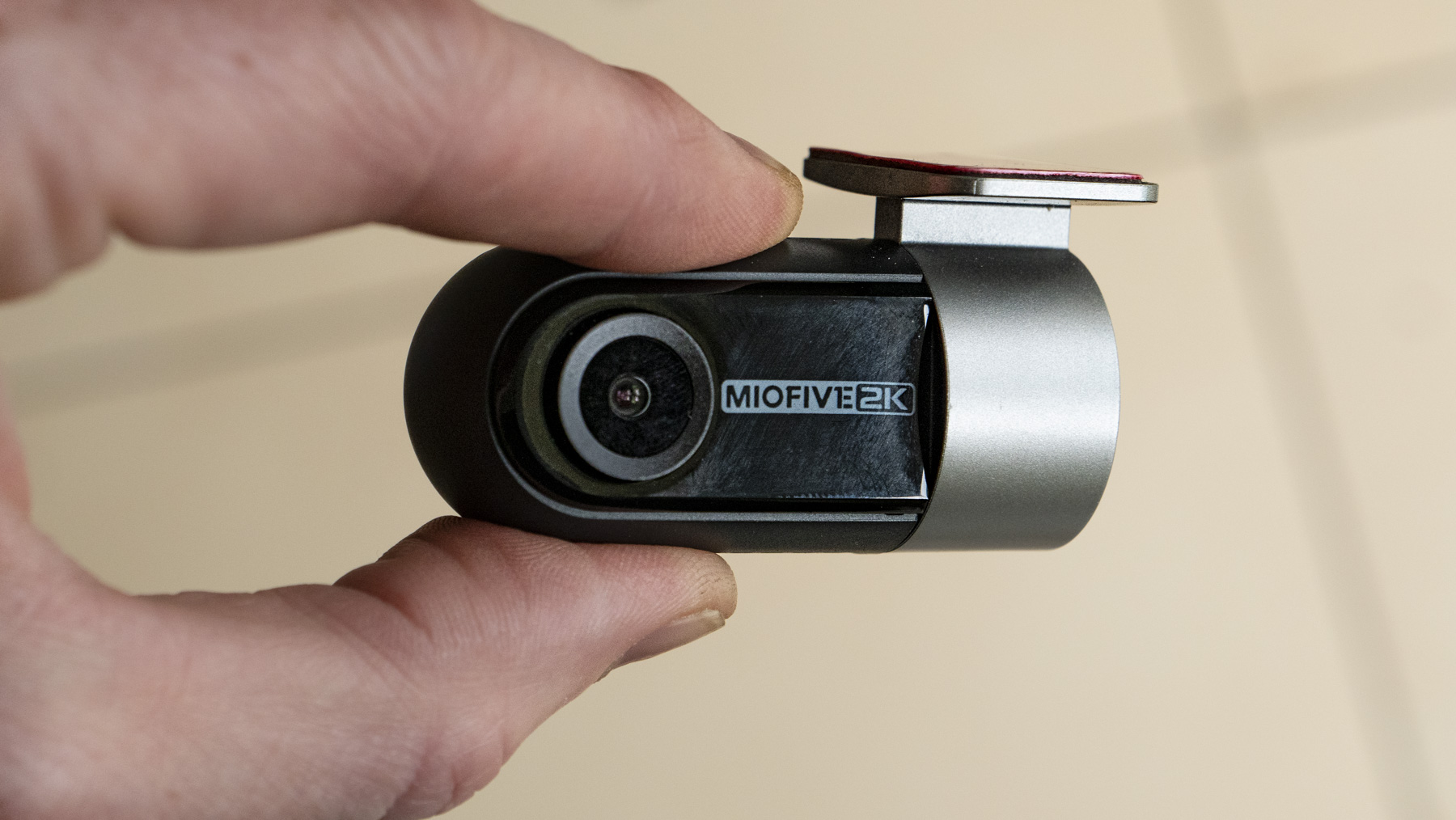 Miofive Dual Dash Cam tiny rear camera in the hand