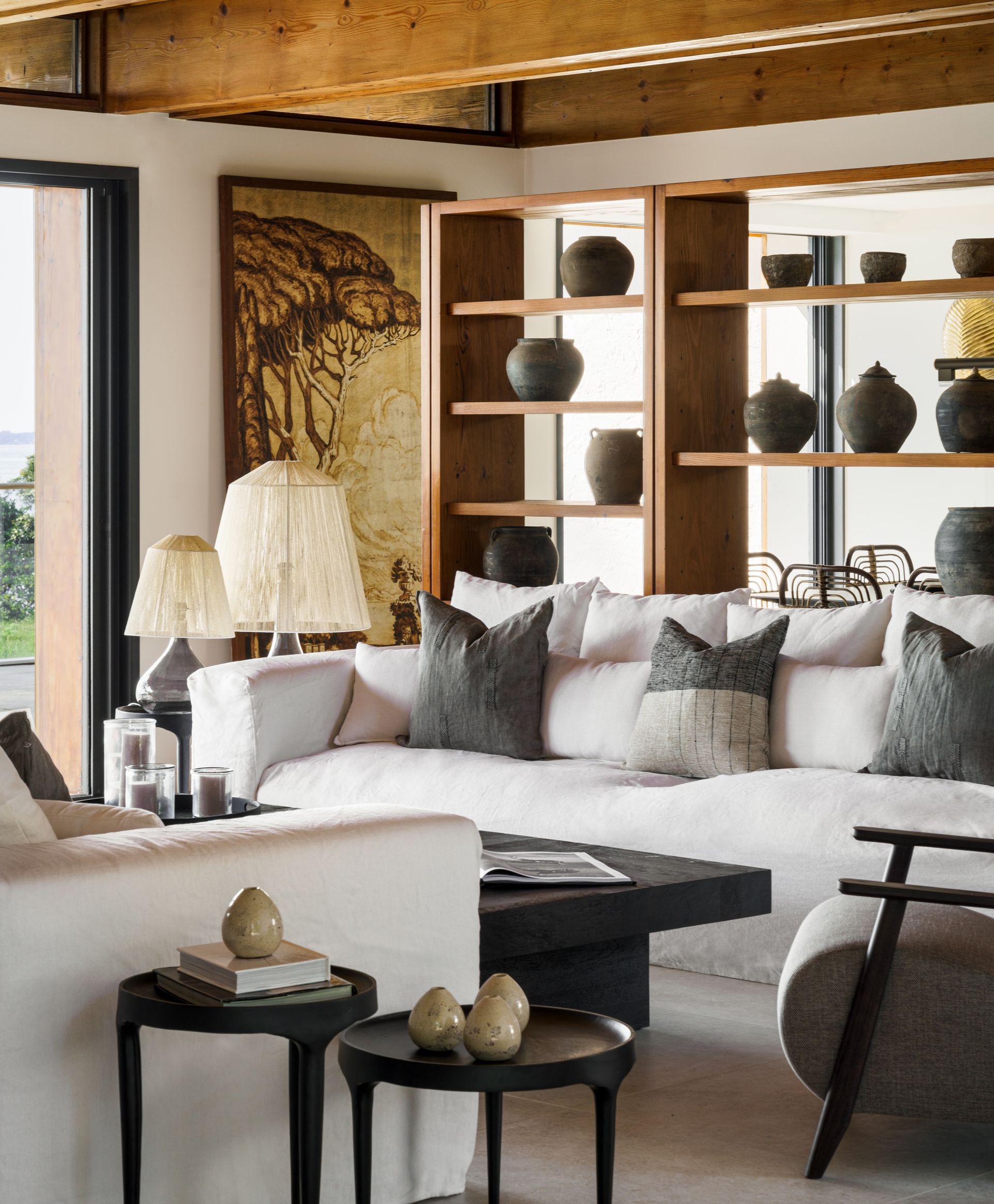 neutral coastal living room with open shelving in France
