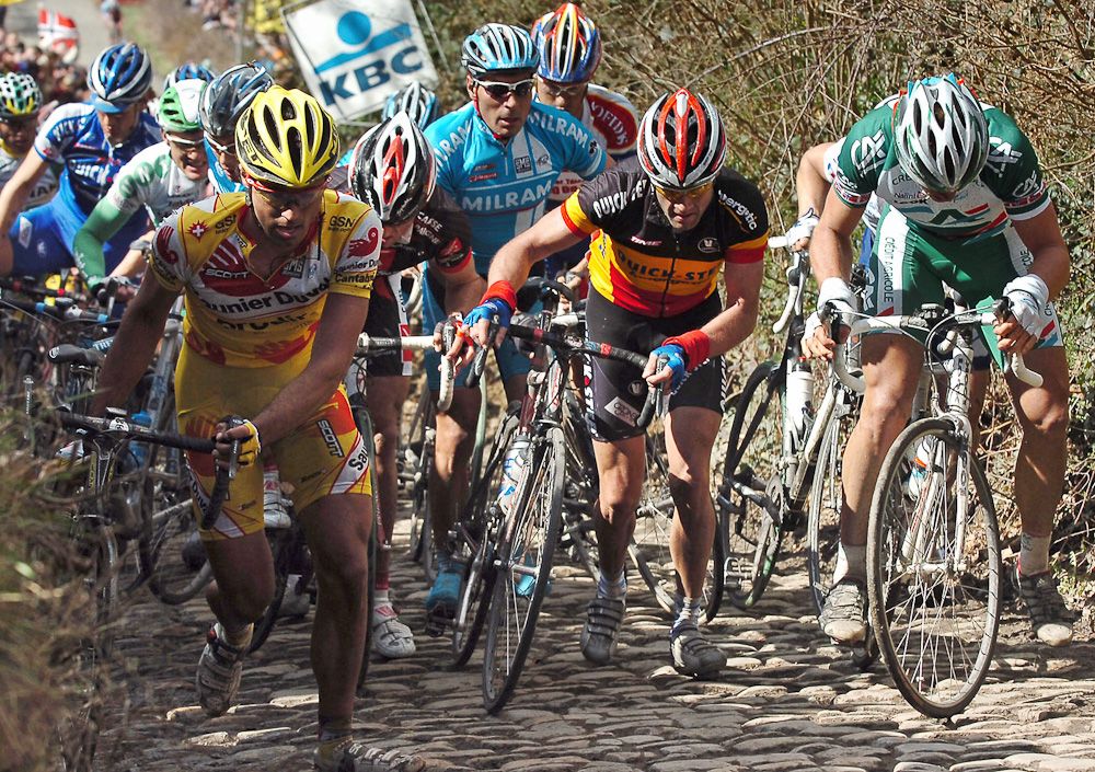 Riders dismount on won of the bergs of Flanders in 2006.
