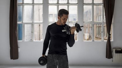 Man doing a dumbbell bicep curl
