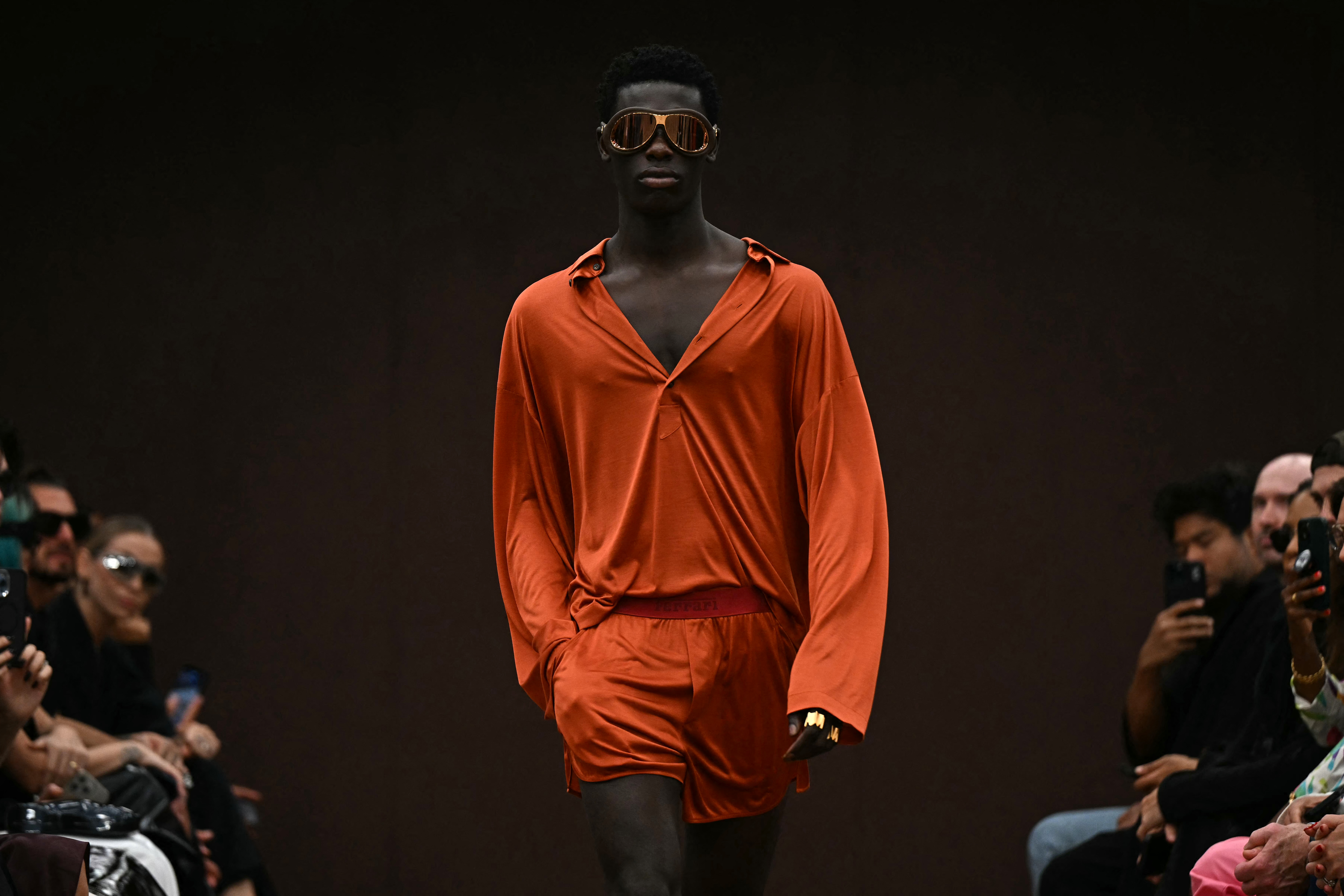 A model walks the runway during the Ferrari collection show at Milan's Fashion Week Womenswear Spring / Summer 2025, on September 21, 2024 in Milan.