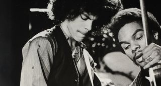 Prince and Dez Dickerson get into the jam onstage in this close-shot black and white pic from 1979.