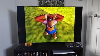 Analogue 3D with no filter enabled, connected to LG OLED C4 TV with Donkey Kong 64 gameplay on screen featuring Lanky Kong.
