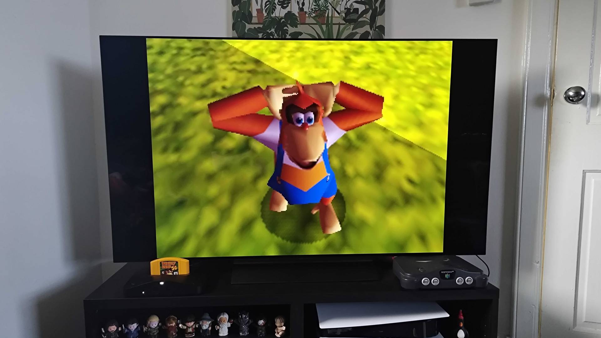 Analogue 3D with no filter enabled, connected to LG OLED C4 TV with Donkey Kong 64 gameplay on screen featuring Lanky Kong.