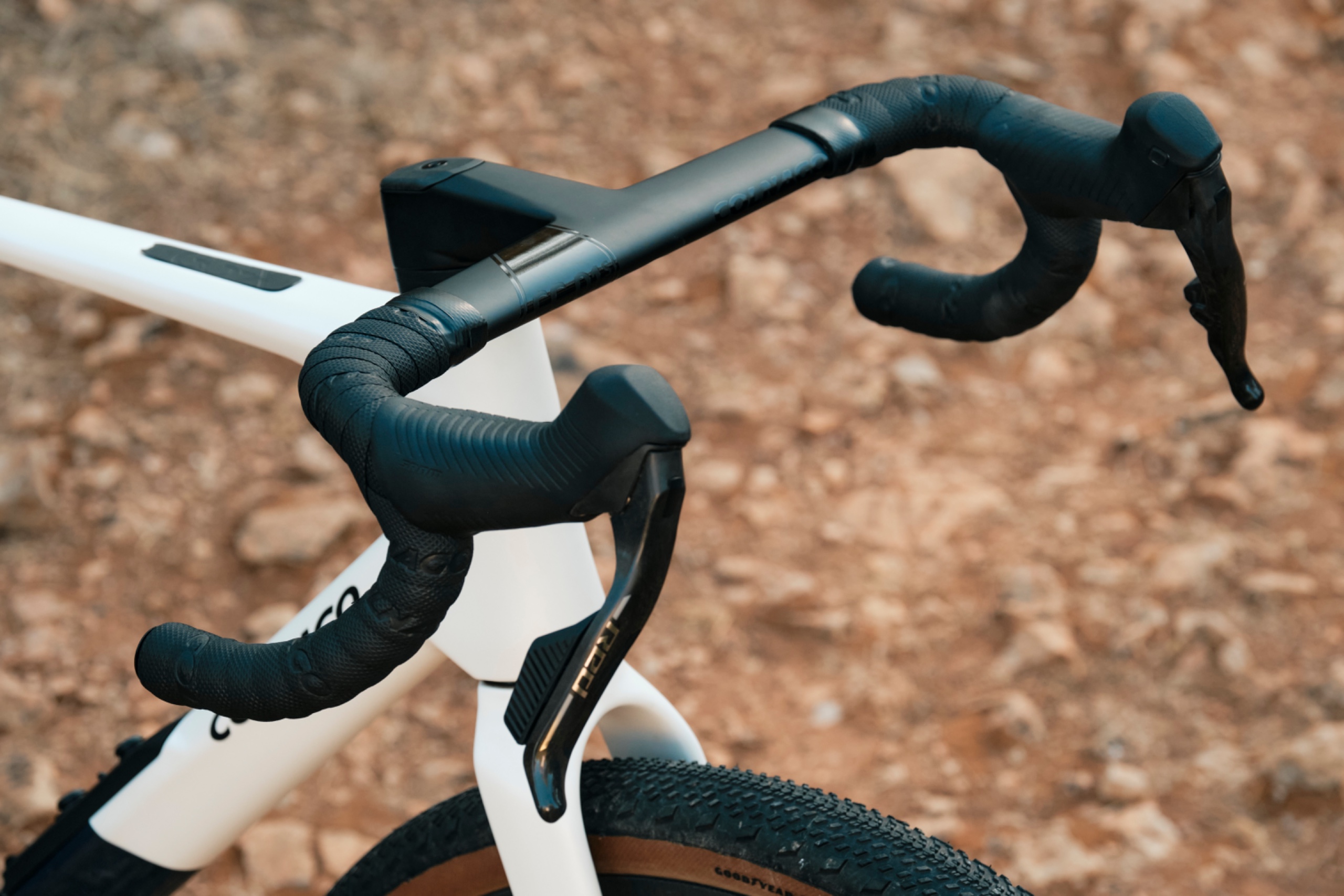 White gravel bike with integrated handlebar