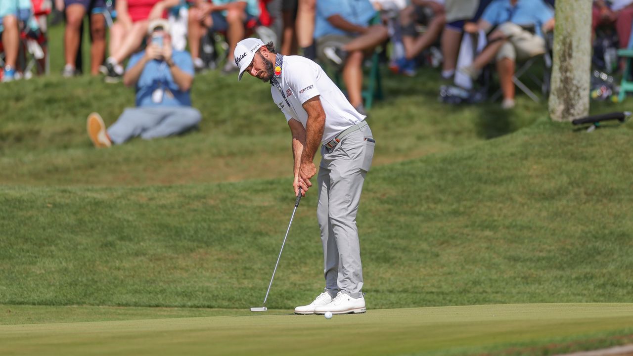 Max Homa putting during the 2023 Players Championship