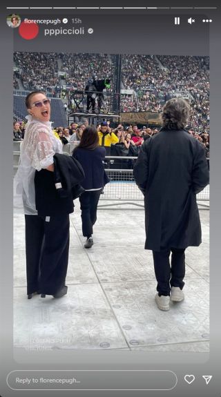 Florence Pugh walking up to the stage at Beyoncé's concert.
