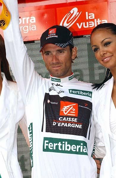 Alejandro Valverde (Caisse d'Epargne) rides in the leader's gold jersey.