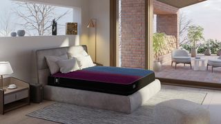 Eight Sleep Pod smart mattress cover in use in a bedroom overlooking a sunny patio