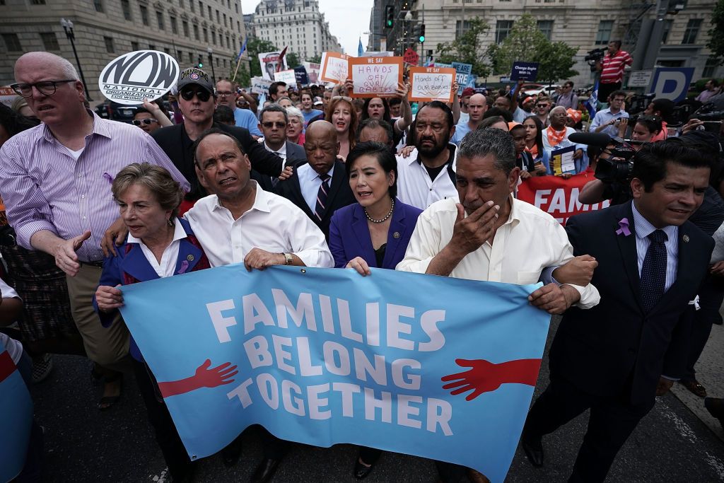 Lawmakers march to U.S. Customs. 