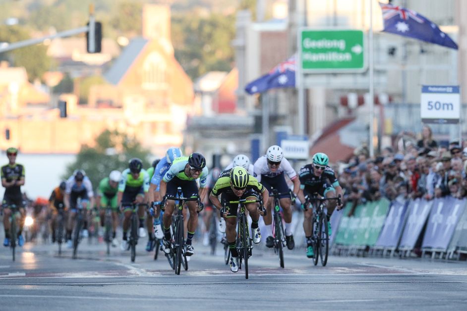 Caleb Ewan uses that familiar aero position to take victory