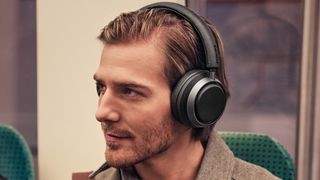 Philips Fidelio L4 headphones worn by a man