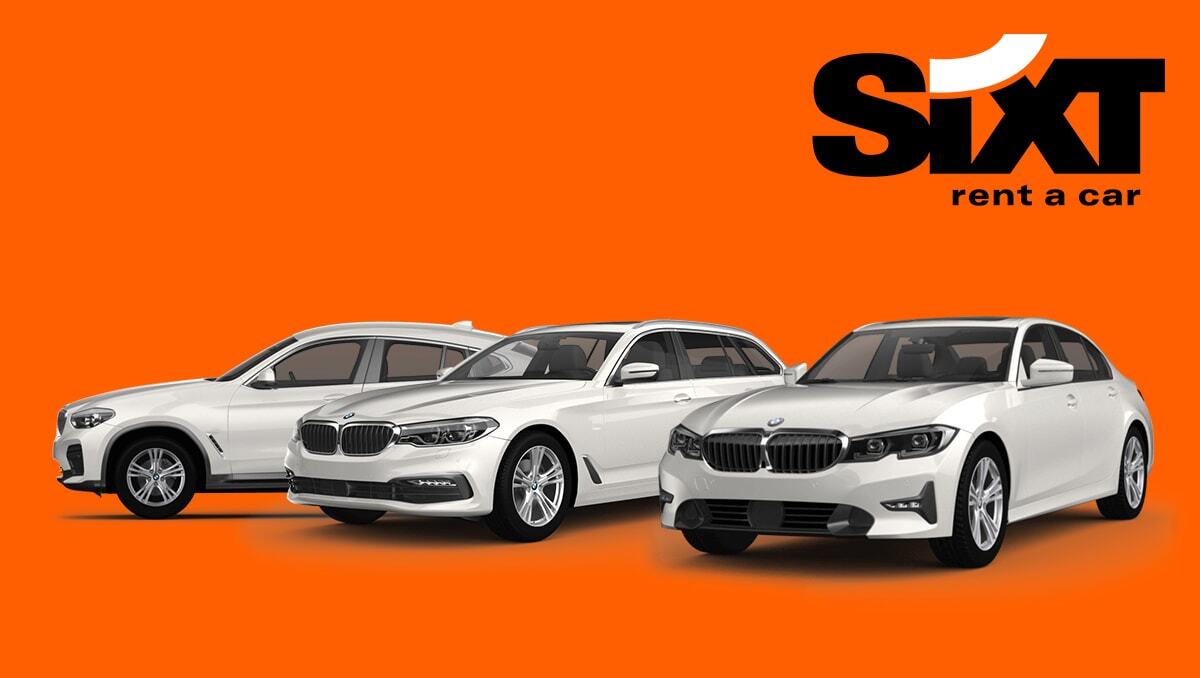 Three white BMW's with the Sixt Rent a Car logo above