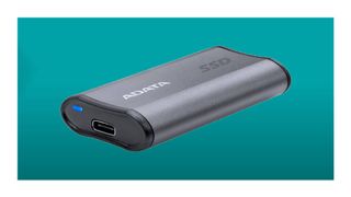 Adata SE880 external SSD on blue background