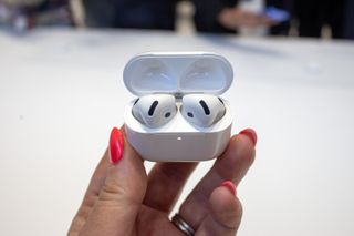 AirPods 4 with rewind logo