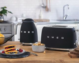 A matte black Smeg kettle and toaster set