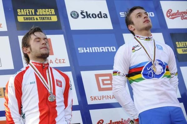 Kacper and Pawel Szczepaniak enjoy the Polish national anthem in Tabor