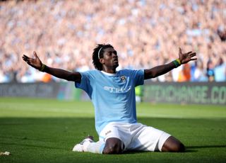 Emmanuel Adebayor celebrates in front of the Arsenal fans after scoring for Manchester City in a 4-2 win over the Gunners in 2009.