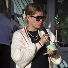 The glowing mom-to-be Sofia Richie, husband Elliot Grainge, and their adorable daughter Eloise share a delightful treat at Rori's Ice Cream in the upscale beach town of Montecito, CA—celebrating their new life following the purchase of a luxurious $10 million mansion.