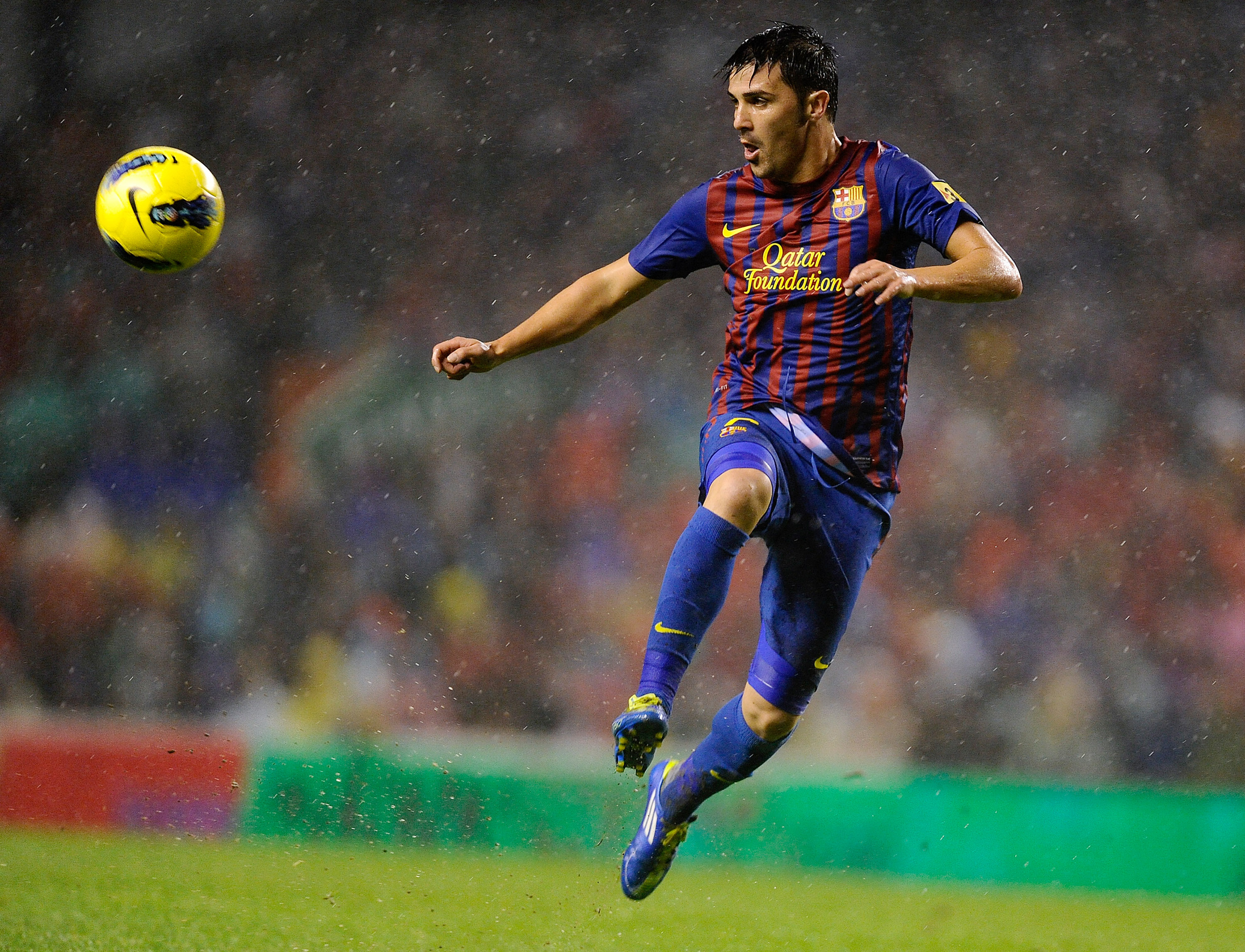 Barcelona's David Villa controls a ball against Athletic Club at San Mames in November 2011.