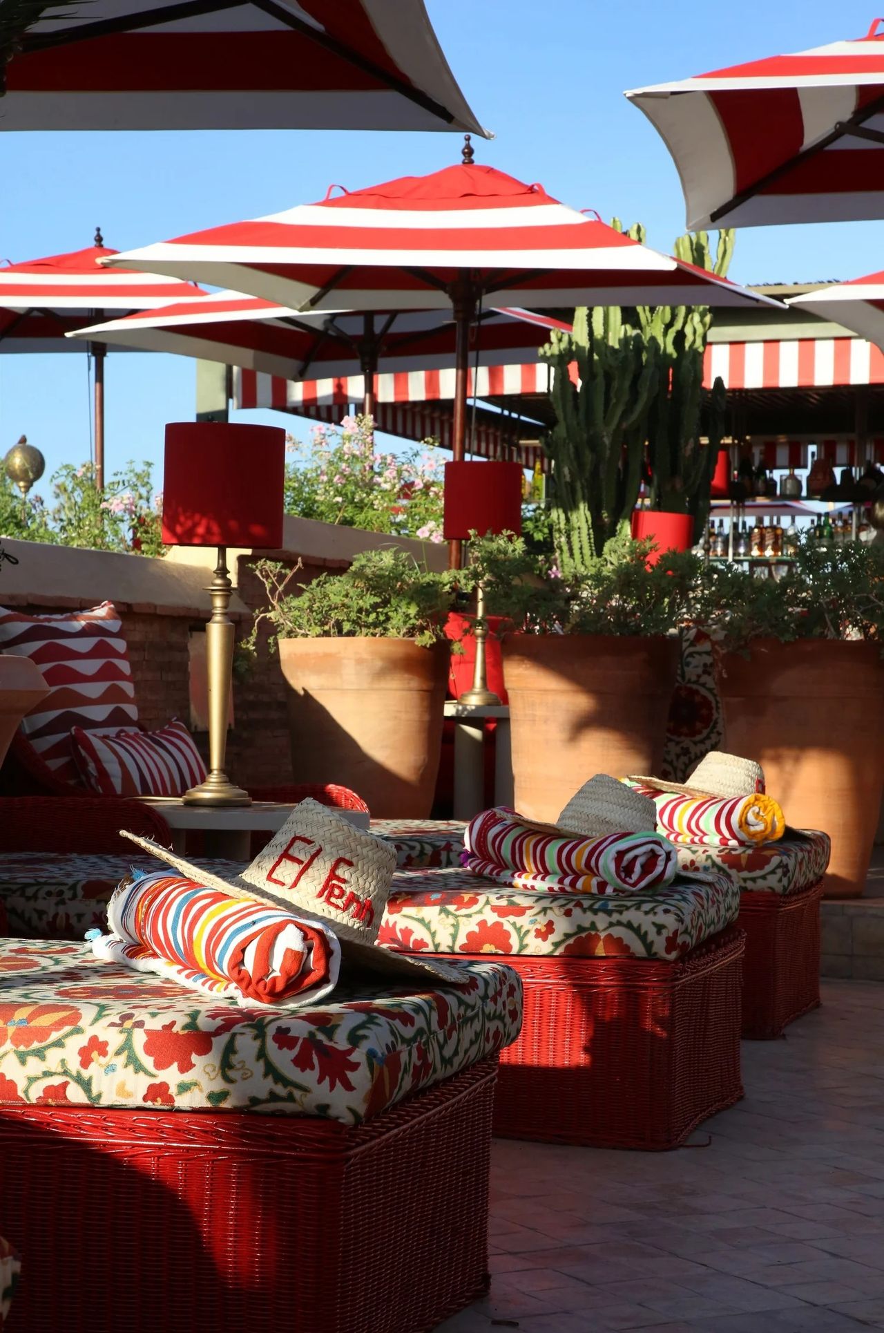 A colorful Moroccan riad has been transformed into a kaleidoscope of patterned textiles, striking artwork, and eye-catching tiles.