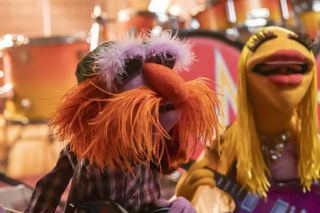Floyd Pepper and Janice in The Muppets Mayhem