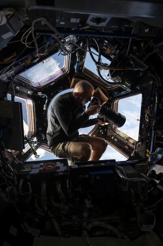 Chris Cassidy floats in the ISS cupola