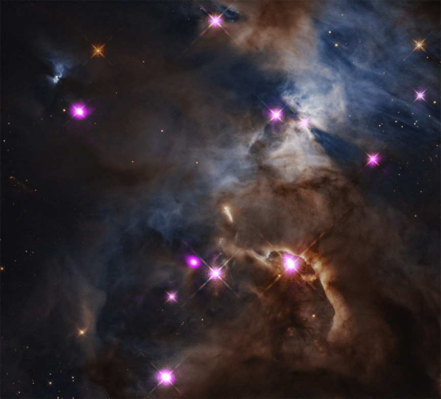 There are several glowing pink dots throughout the cloudy region of space.